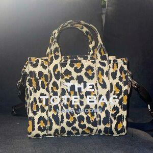 Mark Jacobs the tote bag in the older leopard print in the small size.